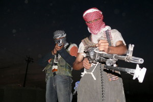 1024px-Iraqi_insurgents_with_guns