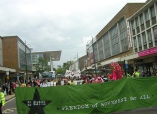 African migrants demonstrate their gratitude to aid worker