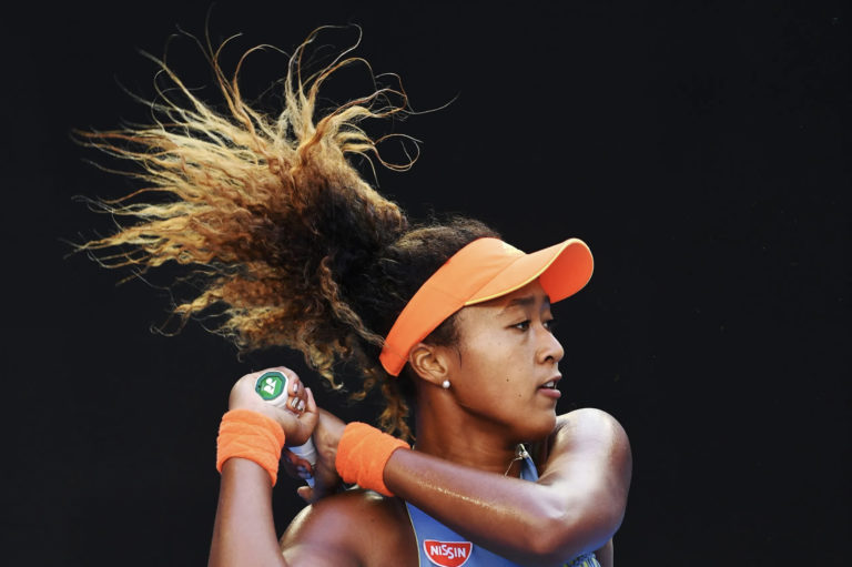 Channel 9 has bizarre fetish for the fuzzy hair of a weird blasian hybrid tennis player