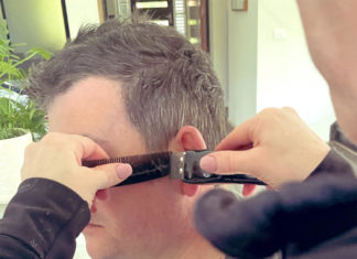 Is that REALLY Daniel Andrews getting a haircut?