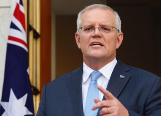 Callum Mouncey throws his handbag at Scott Morrison because he won’t let him play with the girls